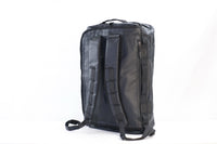 Lumière SHIFT 4-in-1 travel bag rear view showing stowable backpack straps