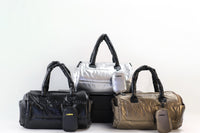 Lumière Statement crossbody bags in black, silver and bronze with zip pouches