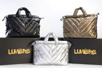 Lumière Statement laptop bags in black, bronze and silver quilted finishes